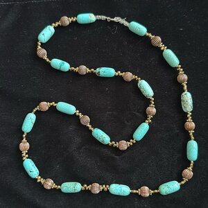 Handmade EUC blue howlite w/ copper, rose goldtone beads.32” drop & lobster claw